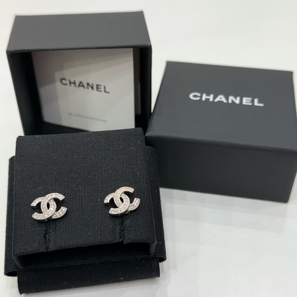 CHANEL Silver Logo Stud Earrings